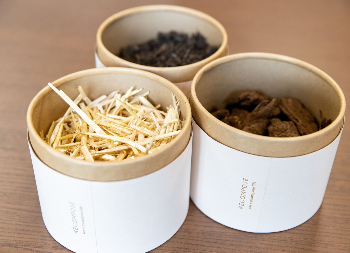 containers of recompose material used to compost human bodies